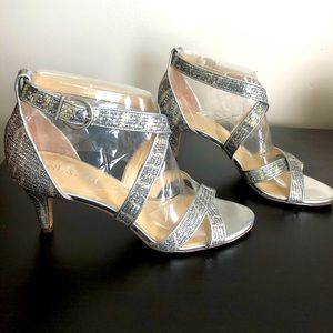 Women’s heels worn down the isle only once .